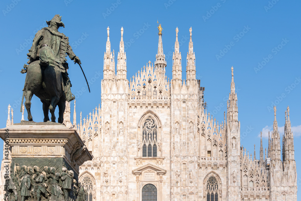 Details of Duomo with the golden statue name 