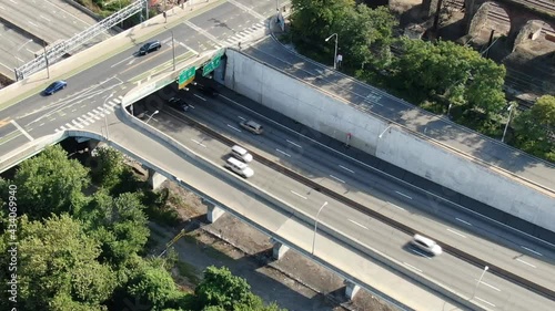 Aerial, Traffic on the highway near between the river and railroad. Philadelphia, Pennsylvania, USA photo