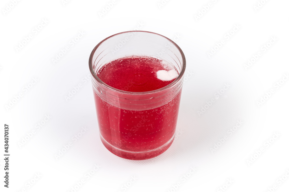 Glass of water with dissolved in it effervescent tablet Glass of water with dissolved in it effervescent tablet