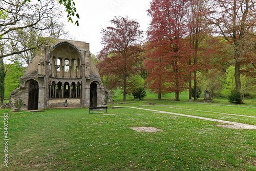 Famous choir ruins of Kloster Heisterbach with green garden, near Koenigswinter, Germany photo