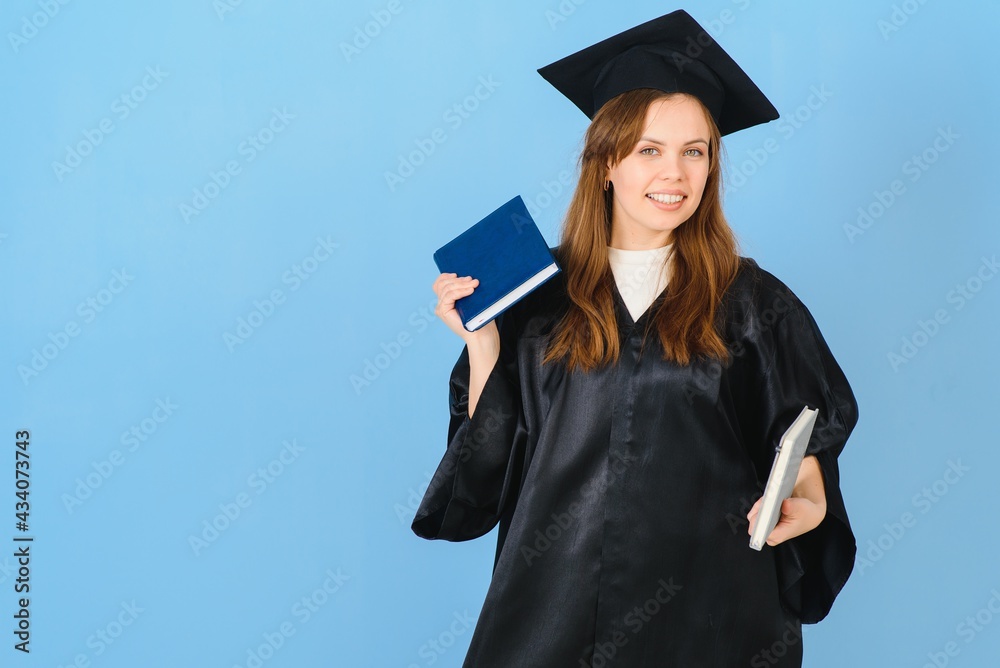 Beautiful woman wearing graduation cap and ceremony robe holding degree looking positive and happy standing and smiling with a confident smile. Beautiful woman wearing graduation cap and ceremony robe holding degree looking positive and happy standing and smiling with a confident smile.
