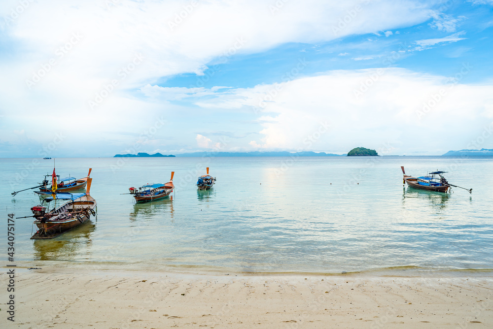 boat parking at Sunrise beach of Lipe island, Thailand. Lipe island is known as Maldives of Thailand because there beautiful beach with clear sea water and fantastic coral reef