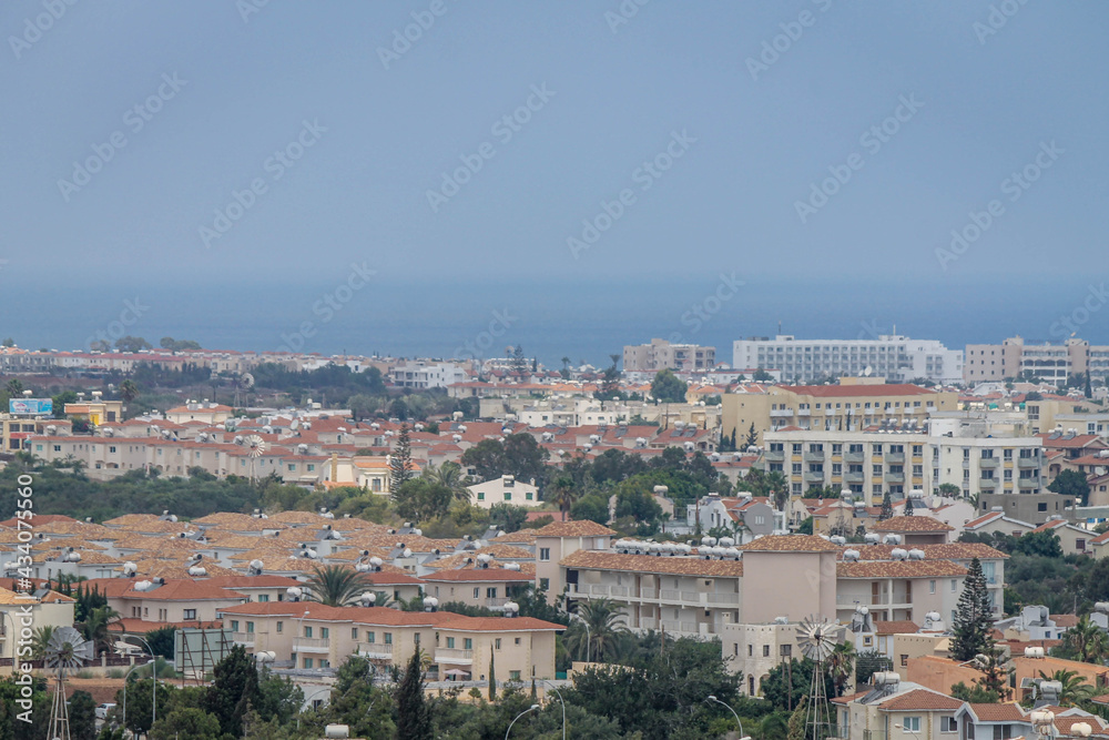 Fototapeta premium View from the hill to the rooftops of Protaras and the sea