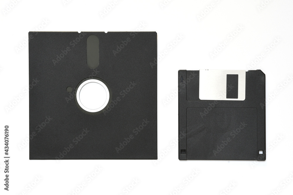 5.25 inch and 3.5 inch floppy diskettes isolated on white 5.25 inch and 3.5 inch floppy diskettes isolated on white