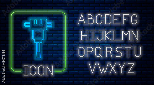 Glowing neon Construction jackhammer icon isolated on brick wall background. Neon light alphabet. Vector