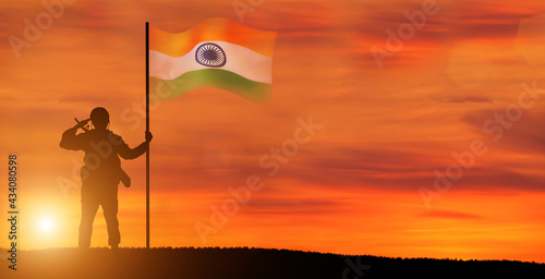 Fototapeta Naklejka Na Ścianę i Meble -  Soldier with Indian flag. Greeting card for Republic Day , Independence Day . National celebration.