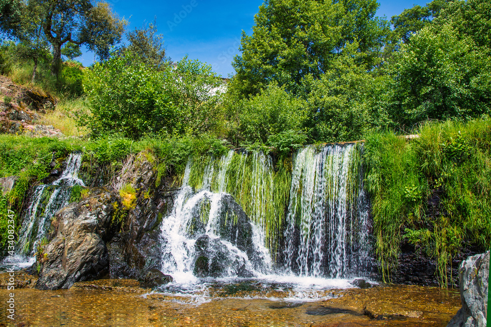 Waterfall Of A Natural Pool Located In Las Hurdes North Of Cáceres-Spain Waterfall Of A Natural Pool Located In Las Hurdes North Of Cáceres-Spain