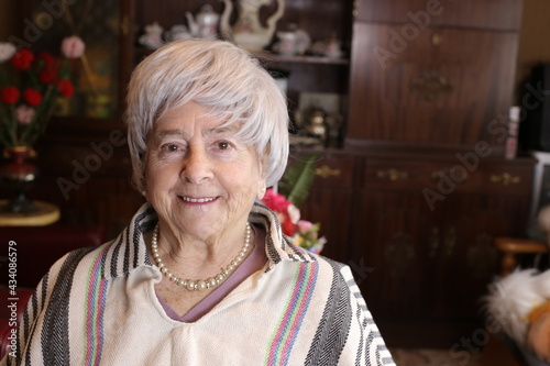 Senior Hispanic woman wearing a ruana