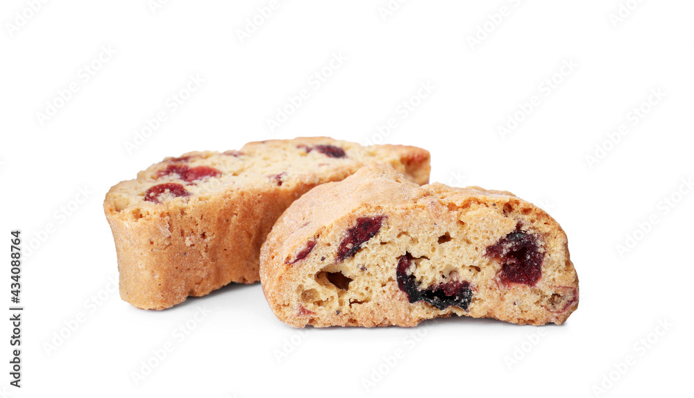 Slices of tasty cantucci with berry on white background. Traditional Italian almond biscuits Slices of tasty cantucci with berry on white background. Traditional Italian almond biscuits