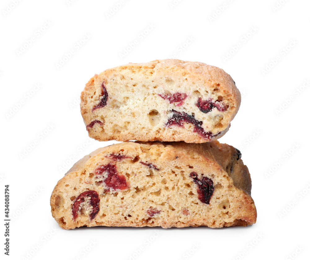 Slices of tasty cantucci with berry on white background. Traditional Italian almond biscuits Slices of tasty cantucci with berry on white background. Traditional Italian almond biscuits