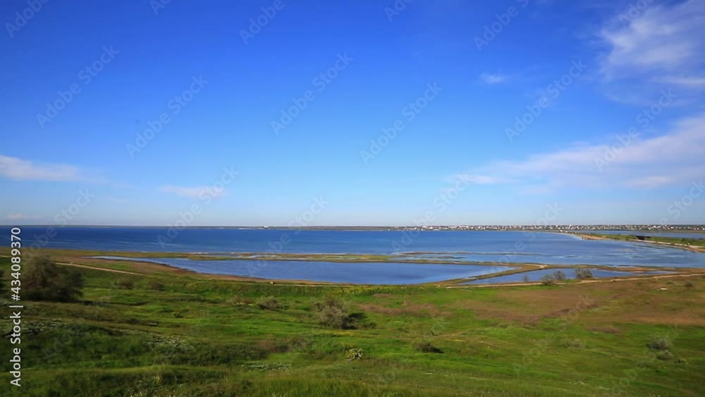 Panorama of blue lakes from a height, blue sky with clouds Panorama of blue lakes from a height, blue sky with clouds