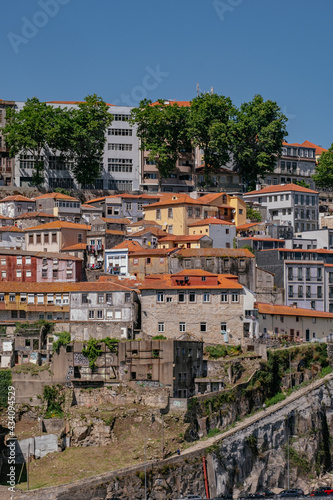 Traditional Colorful Houses in Guindais Cliff - Porto, Portugal photo