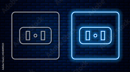Glowing neon line Electrical outlet icon isolated on brick wall background. Power socket. Rosette symbol. Vector