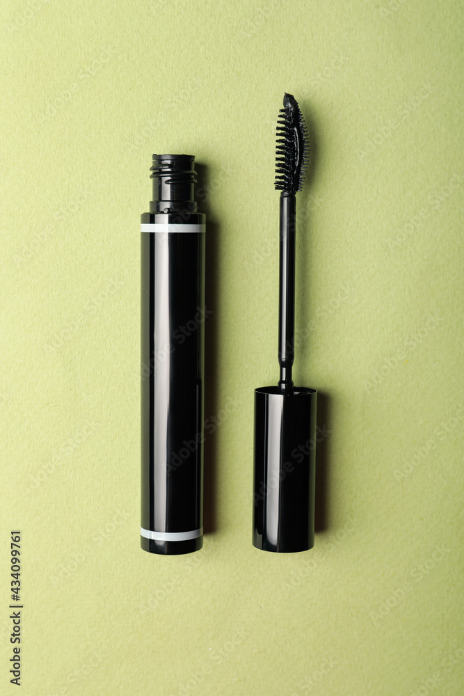 Mascara for eyelashes on light background, flat lay. Makeup product Mascara for eyelashes on light background, flat lay. Makeup product