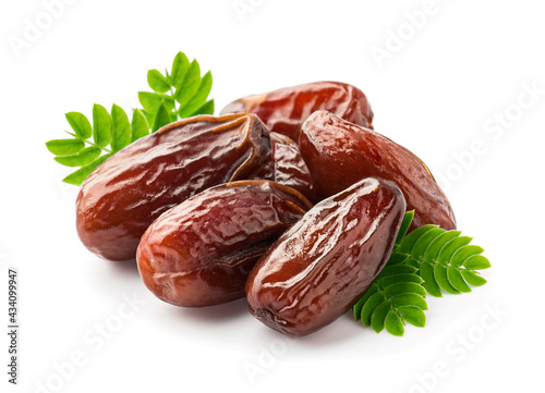 Fruits dates with leaves on white backgrounds