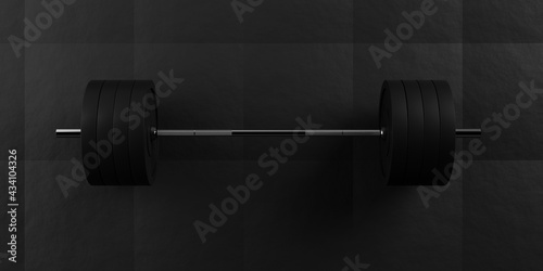 Barbell with chrome handle and black plates in front on floor on black mats background, sport, fitness, exercise or weightlift concept, top view