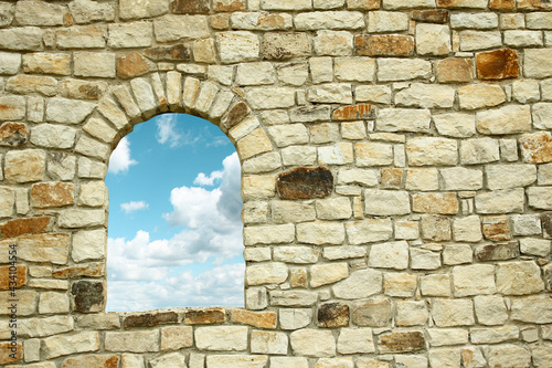 old wall with window and view of the clouds © Kostia