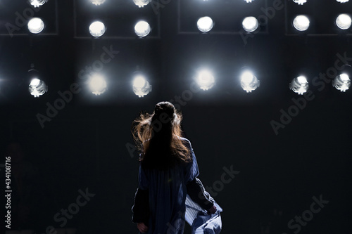Fashion Show, CatwalkFashion catwalk runway event, model walking the show finale.