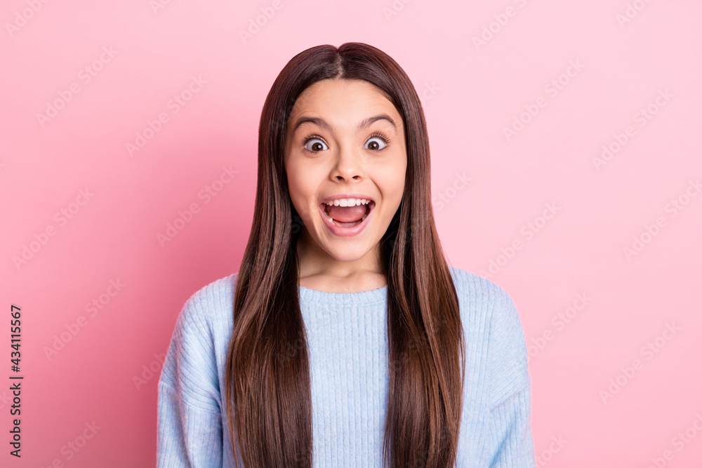 Portrait of attractive crazy cheerful girl great news reaction isolated over pink pastel color background Portrait of attractive crazy cheerful girl great news reaction isolated over pink pastel color background