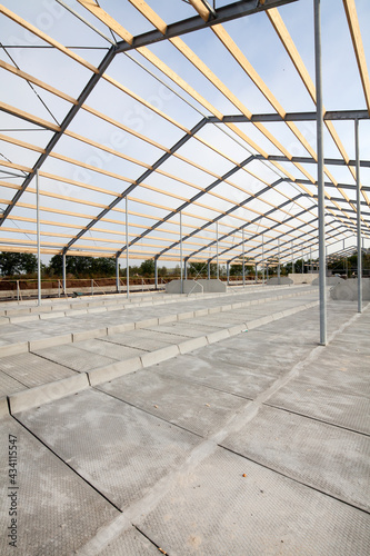 Building a new cattle stable. Construction site. Framework. Farming. Netherlands.