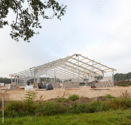Building a new cattle stable. Construction site. Framework. Farming. Netherlands.