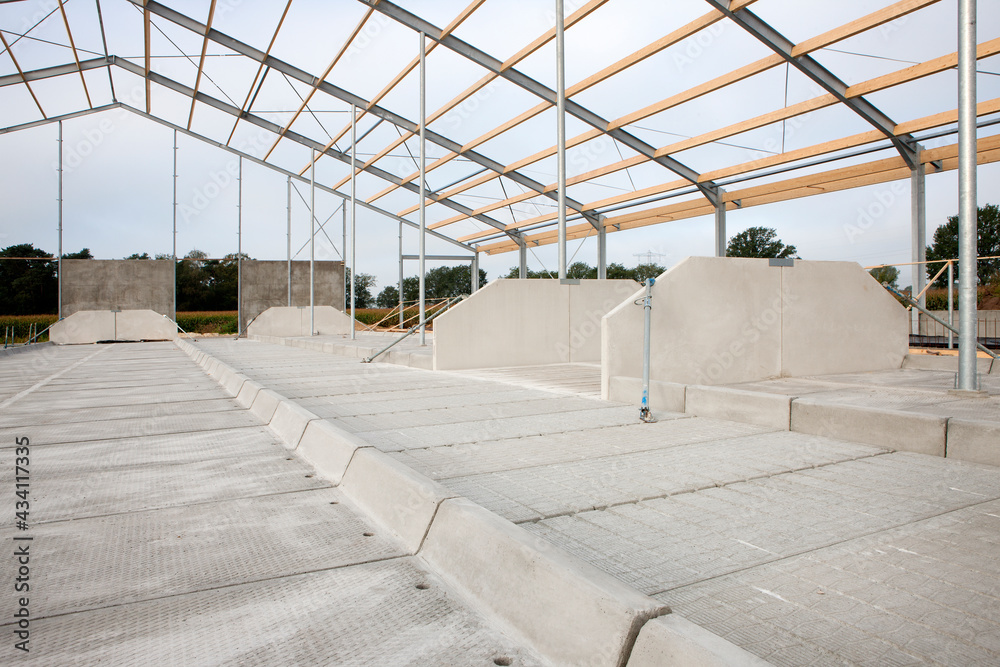 Concrete. Building a new cattle stable. Construction site. Framework. Farming. Netherlands.