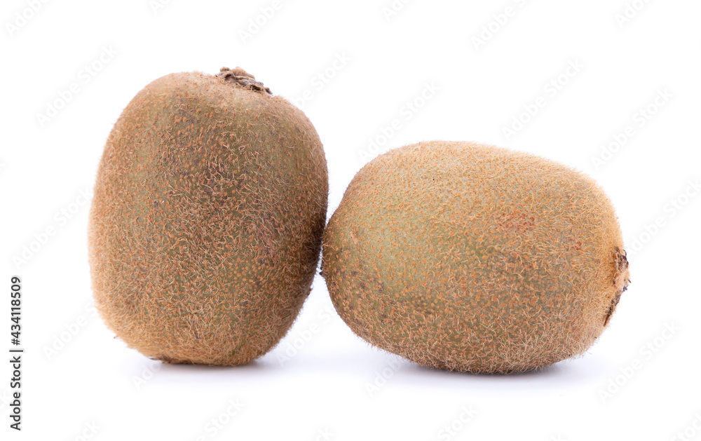 Two whole kiwis on a white background, one vertically, the other horizontally, isolated Two whole kiwis on a white background, one vertically, the other horizontally, isolated