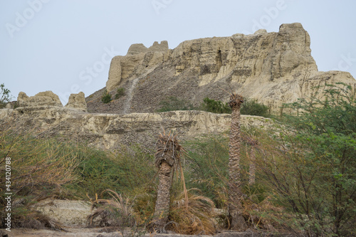 A historical place in Mir e Kalat near Turbat Kech with view of beautiful mountain, dates tree summer season Balochistan Pakistan photo photo