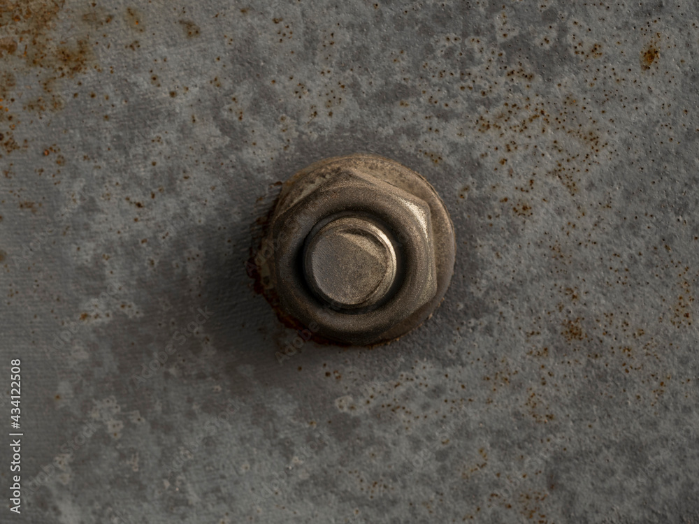Rusted bolt and nut on a rusted iron surface close-up macro photography. Selective focus Rusted bolt and nut on a rusted iron surface close-up macro photography. Selective focus