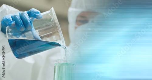 Composition of female scientist in lab using beaker with motion blur