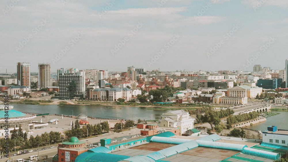 Panorama of a big city with a river in the center