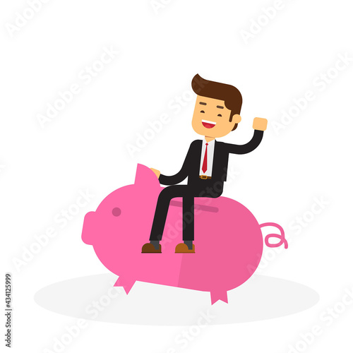 businessman sits on big piggy bank