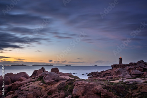 Lighthouse of Ploumanach at sunset in Perros-Guirec, Côtes d'Armor, Brittany, France