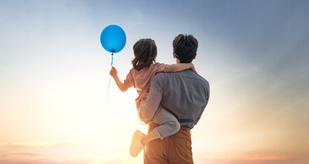 Father and his daughter outdoors