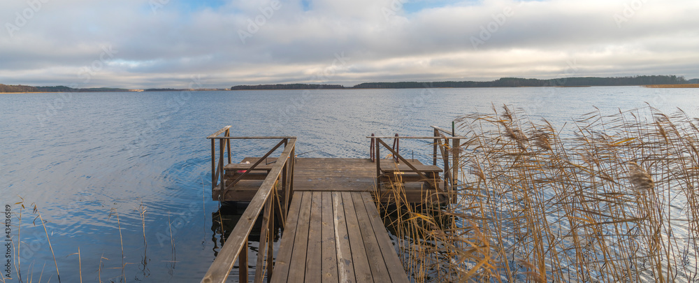 forest and lake in autumn. Northern Europe.