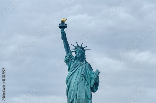 Statue of Liberty on the background of sky, New York City. © Elena Titova