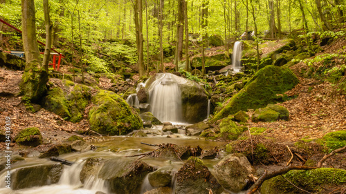 Pośny waterfall in the Stolowe Mountains, Radkow, Poland. photo