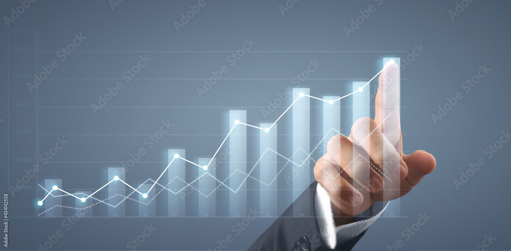 Businessman plan graph growth increase of chart positive indicators in his business Businessman plan graph growth increase of chart positive indicators in his business