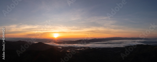 over the sunrise at morning and  mist in the valley © SHUTTER DIN