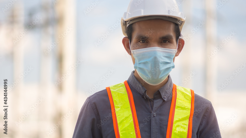 Engineer wear medical mask protect covid19 coronavirus and working outdoor Engineer wear medical mask protect covid19 coronavirus and working outdoor
