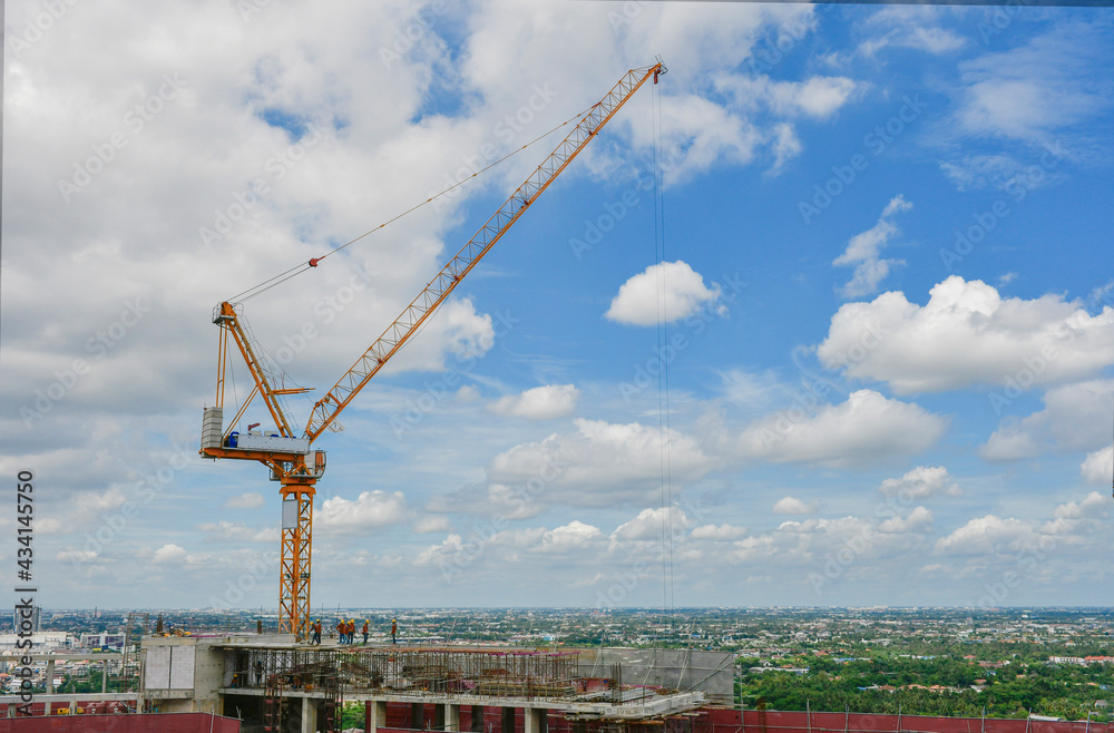 The Crane tower in construction  site of a high-rise condominium.