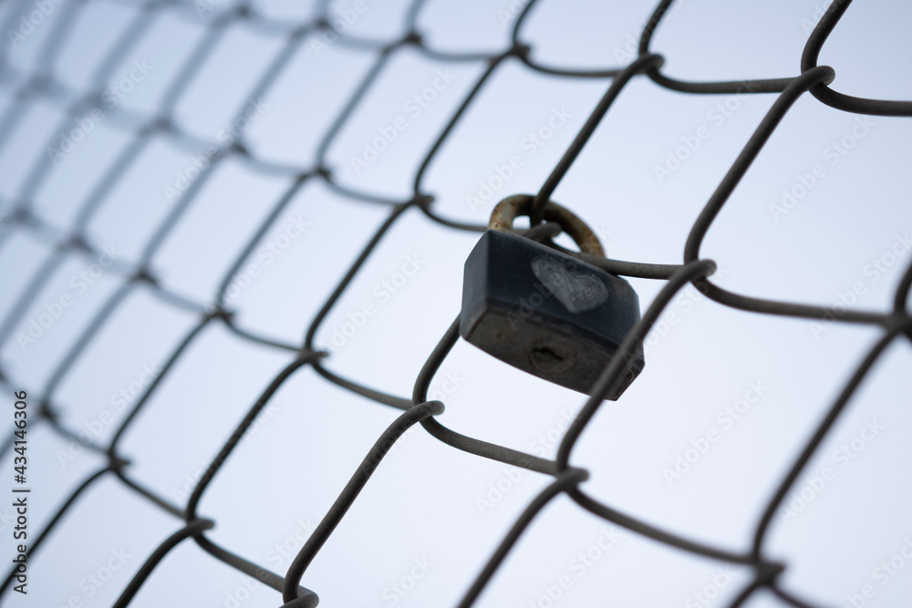 padlock on fence padlock on fence