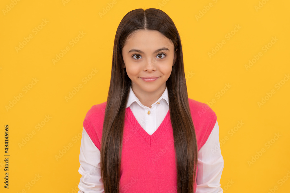 childhood happiness. back to school. cheerful kid face portrait. smiling child has long hair. childhood happiness. back to school. cheerful kid face portrait. smiling child has long hair.