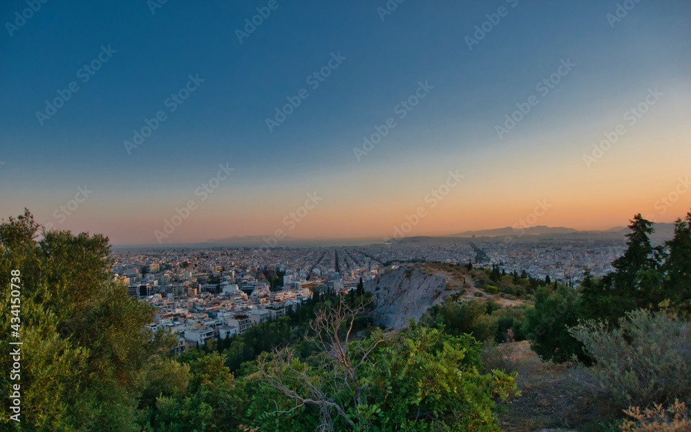 magic hour in Athens, Greece, scenic panoramic view of the urban texture