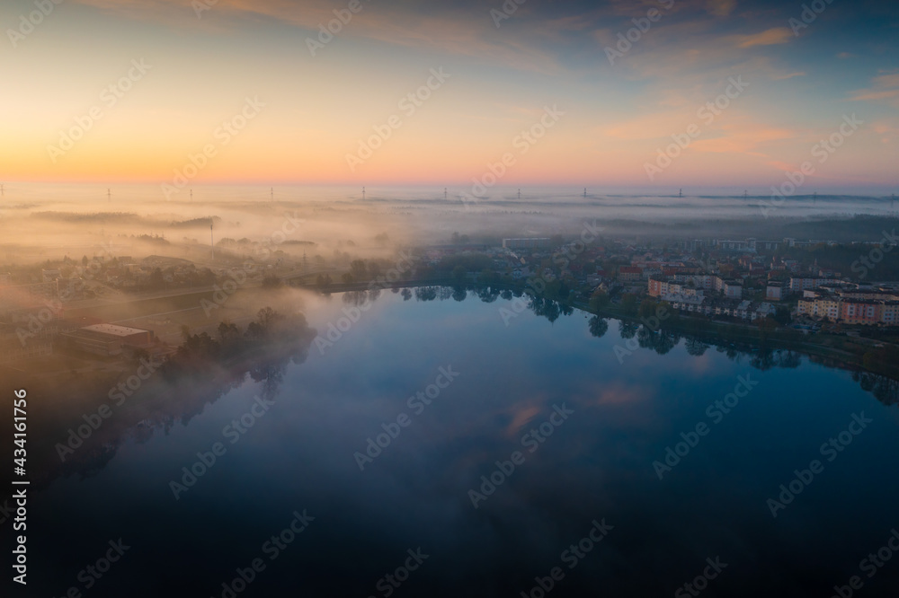 Misty dawn at the Elk city. Masuria, Poland.