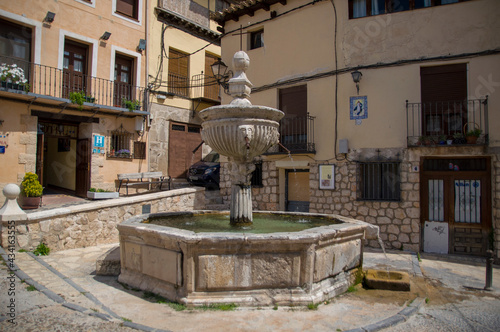 Fuente de los cuatro caños, cada caño tiene una cara de un hombre en las cuatro etapas de la vida. Pastrana, Guadalajara, Castilla la Mancha, España photo