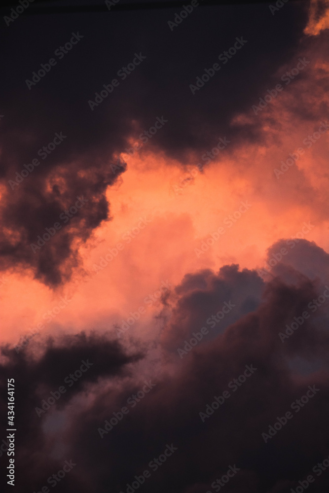 

orange clouds and black sunset tones