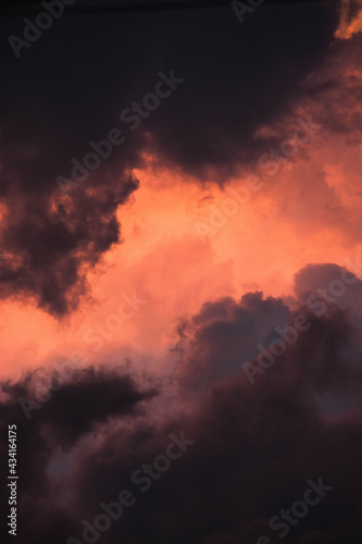 orange clouds and black sunset tones