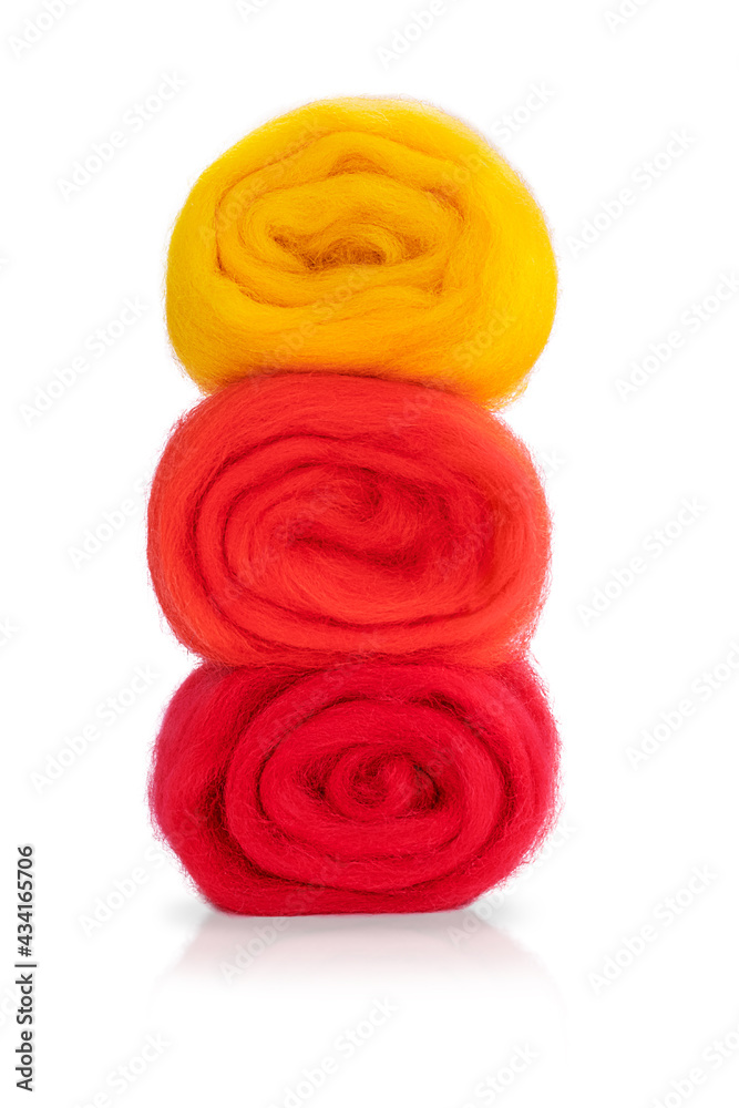 Three balls of natural wool isolated on a white background. Suitable for knitting, wool felting. Wool for needlework. Merino, sheep's wool. Three balls of natural wool isolated on a white background. Suitable for knitting, wool felting. Wool for needlework. Merino, sheep's wool.