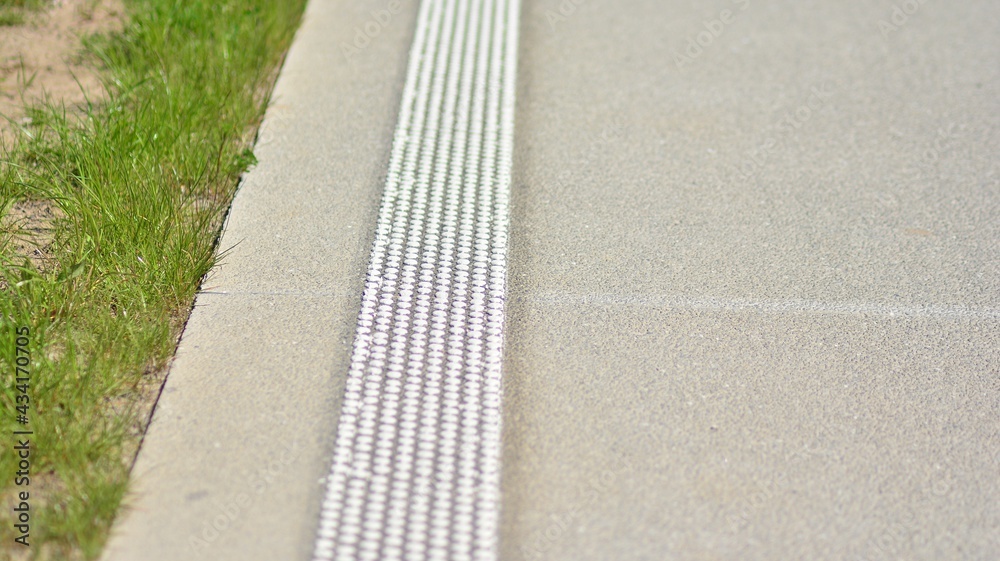 Obraz premium Straight modern concrete motorway with bright road marking. Transportation road system infrastructure. 